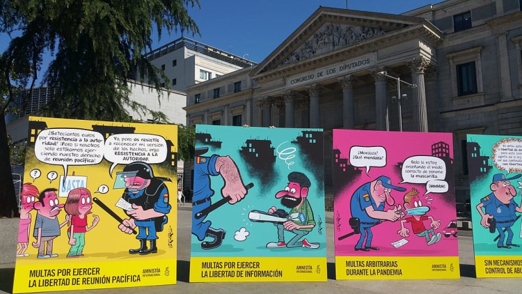 Acte d'Amnistia Internacional per denunciar els abusos policials al Congrés dels Diputats| Amnistia Internacional/Adolfo Luján